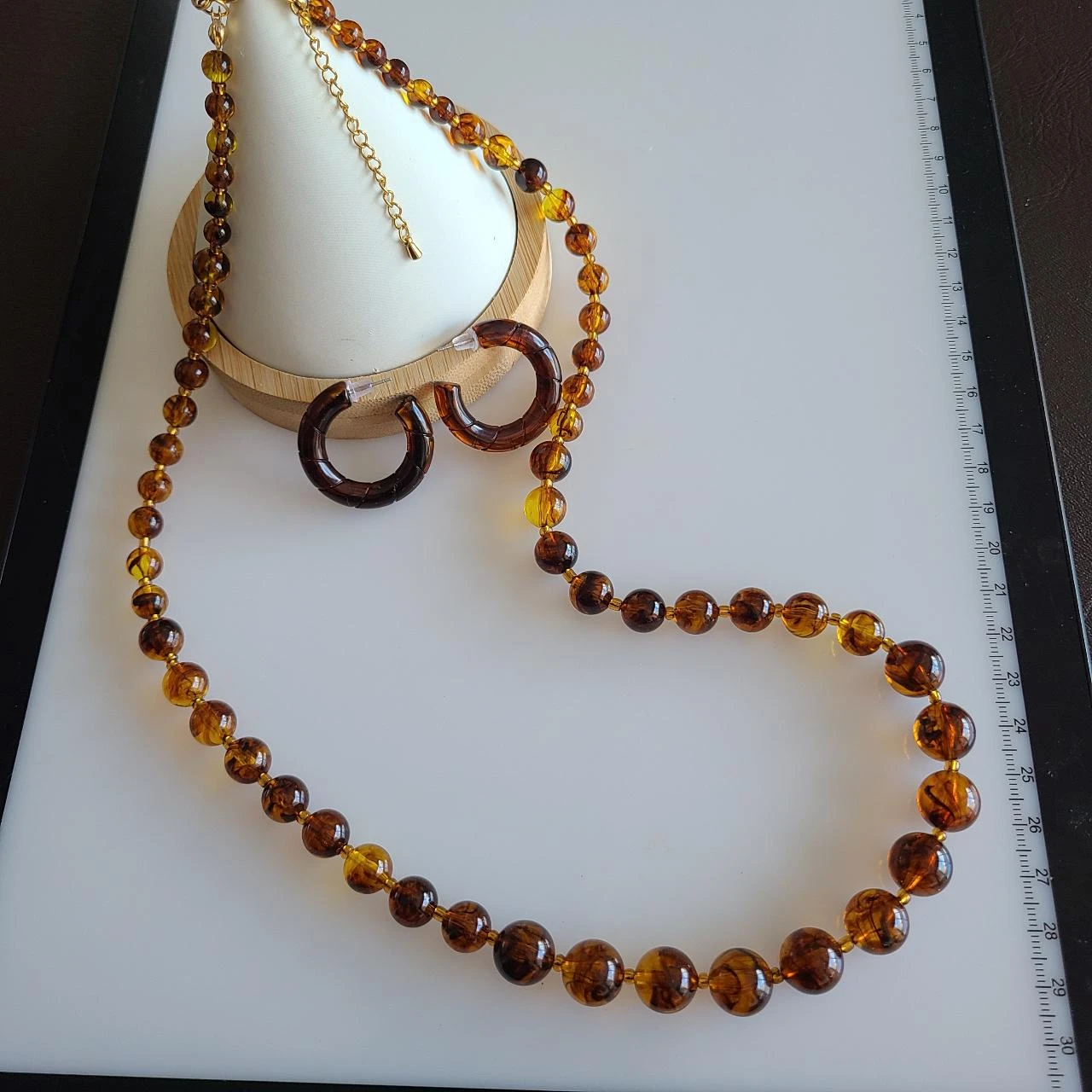 Parure collier & créoles en perles résine transparente ambre marbré PA611